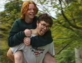 Paul Smith carries Jon Burgess back to the hostel - as he has no shoes!